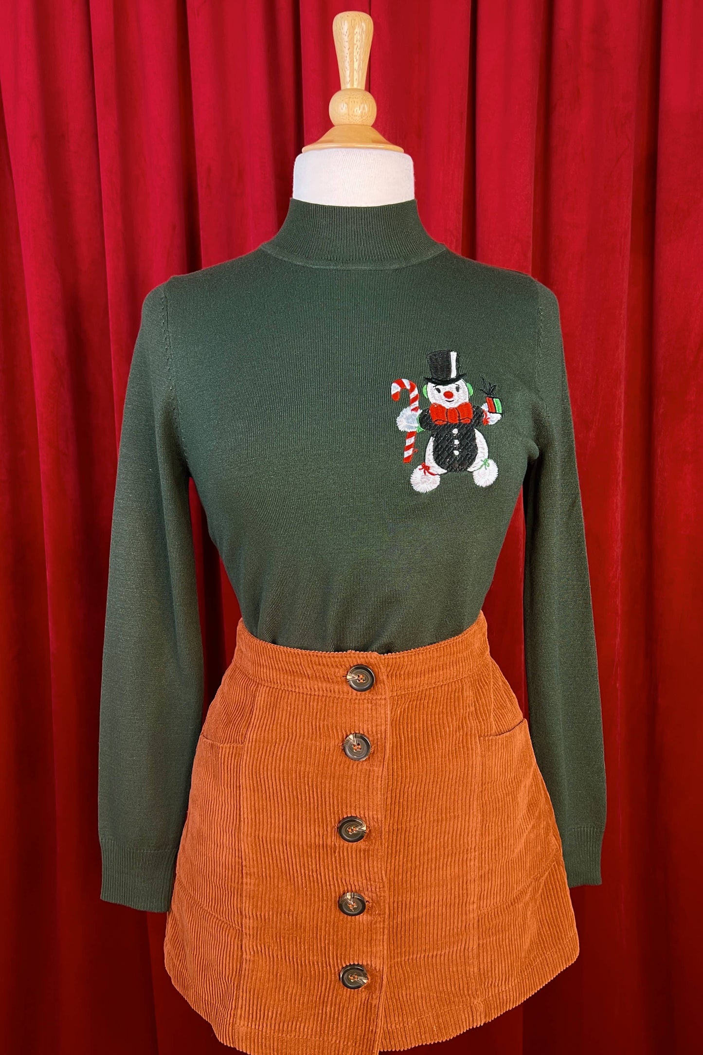 Snowman Pom Pom Mock Neck Sweater in Olive